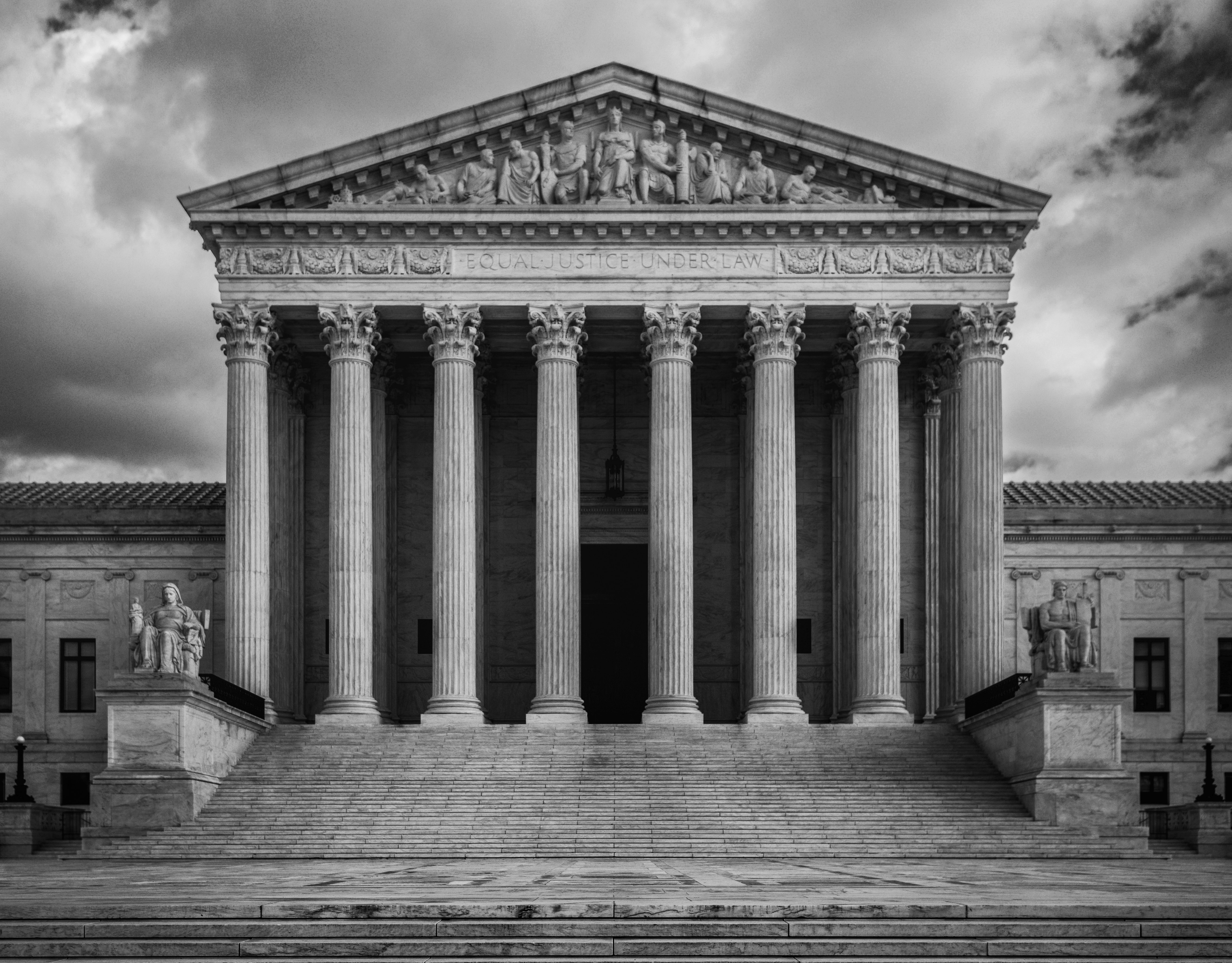 Photo of the U.S. Supreme Court with dark clouds