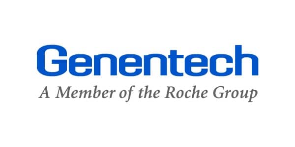 Genentech logo. Blue letters on a white background. In gray letters it reads: A Member of the Roche Group.
